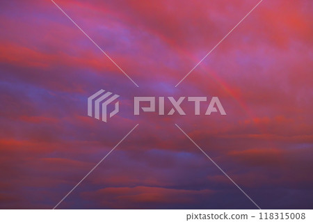 A breathtaking vibrant and colorful sunset sky with rainbow 118315008