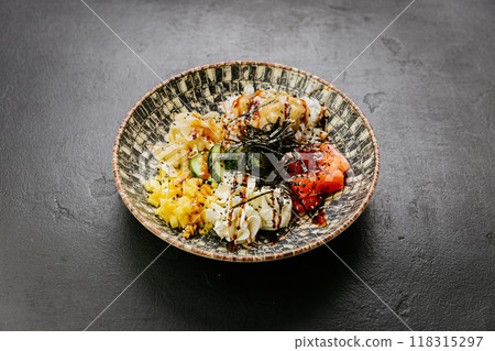 Delicious poke bowl with fresh salmon, mango, rice, seaweed - perfect for healthy and colorful meals 118315297
