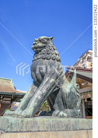 Guardian lion at Imamiya Ebisu Shrine in Naniwa Ward, Osaka 118315422