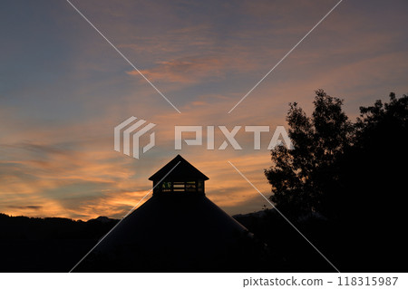 The triangular roof of Hakushu Roadside Station at sunrise, Hakushu Town, Hokuto City The triangular roof of Hakushu Roadside Station at sunrise, Hakushu Town, Hokuto City 118315987