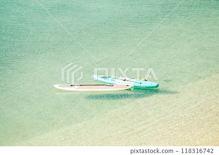 Stand up paddle board on the beach Stand up paddle board on the beach 118316742