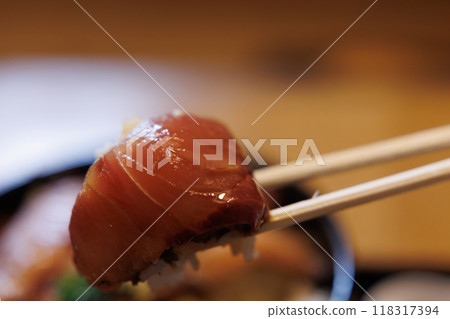 Pickled yellowtail rice bowl with chopsticks (Aomori Prefecture izakaya lunch) Pickled yellowtail rice bowl with chopsticks (Aomori Prefecture izakaya lunch) 118317394