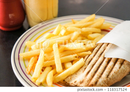 Large serving of fries and toasted sandwiches 118317524