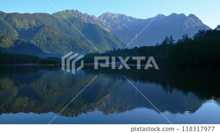 Mt.Hodaka reflected on the water surface Mt.Hodaka reflected on the water surface 118317977