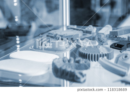 Various objects printed on a 3D printer from molten plastic powder. Different models printed on 3D printer from melted grey polyamide powder. New additive 3D printing Multi Jet Fusion MJF technology 118318689
