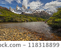 A beautiful river with stones in Los Glaciares national park with the Fitz Roy mountain range in background 118318899