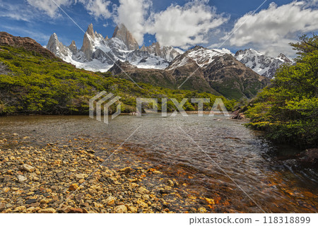 A beautiful river with stones in Los Glaciares national park with the Fitz Roy mountain range in background A beautiful river with stones in Los Glaciares national park with the Fitz Roy mountain range in background 118318899