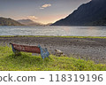 Bench with a peaceful view on the Hornopiren fjord on sunset 118319196