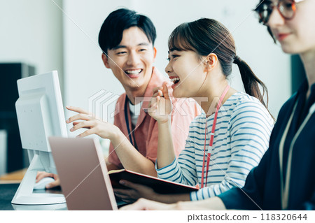 Young engineer working in the office 118320644