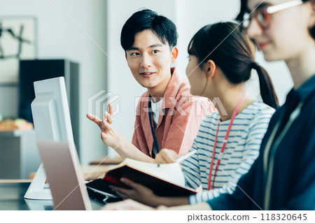 Young engineer working in the office 118320645