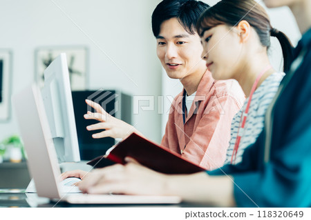 Young engineer working in the office 118320649