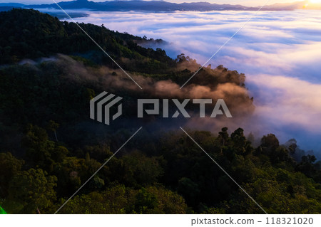 Amazing Sunrise or sunset over mountains hills covered with mist, Aerial view landscape drone shot beautiful colorful nature background 118321020