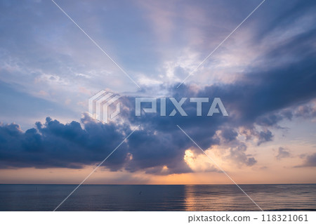 Sunset sky background,Landscape nature beautiful Light Sunset or sunrise over sea, Colorful clouds scenery sky,Amazing clouds and waves in sunset sky nature light cloud background Sunset sky background,Landscape nature beautiful Light Sunset or sunrise over sea, Colorful clouds scenery sky,Amazing clouds and waves in sunset sky nature light cloud background 118321061