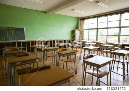 A school classroom with rows of desks and chairs A school classroom with rows of desks and chairs 118321352