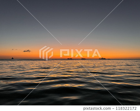 Beautiful gold sunset at the seaside of Philippines Beautiful gold sunset at the seaside of Philippines 118322172