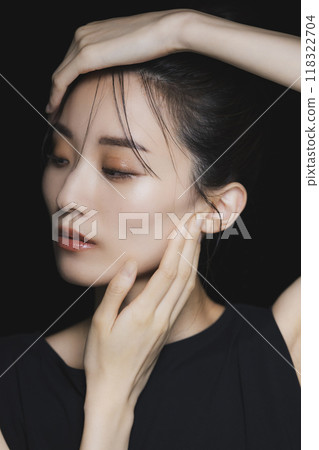 Woman on a black background Woman on a black background 118322704