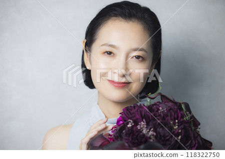 Dressed up middle-aged woman 118322750