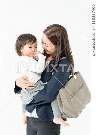 Working mother holding baby girl 118327400