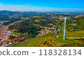 Wind turbine on the background of a small European city, a close-up view. The concept of clean Renewable energy. 118328134