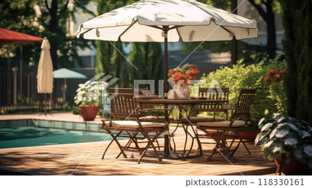 Cafe table with chair and parasol umbrella in the garden 118330161