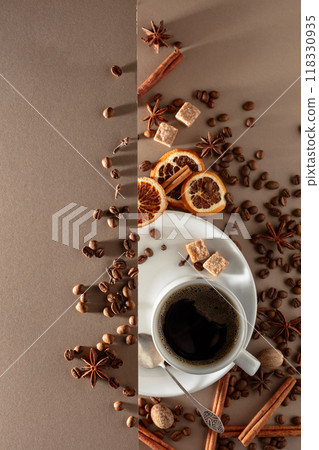 Black coffee with spices on a beige background. Black coffee with spices on a beige background. 118330935