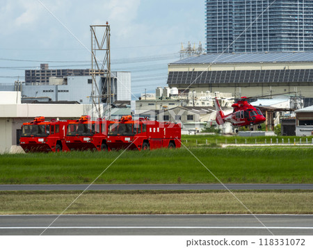Disaster prevention helicopter and airport chemical fire engine taking off from Yao Airport 118331072