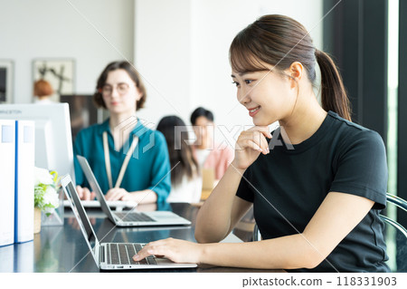 Young female engineer working in an office 118331903