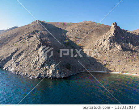 Lake Baikal. Angel Rock. bay at the cliff. Warm autumn days. Lake Baikal. Angel Rock. bay at the cliff. Warm autumn days. 118332037