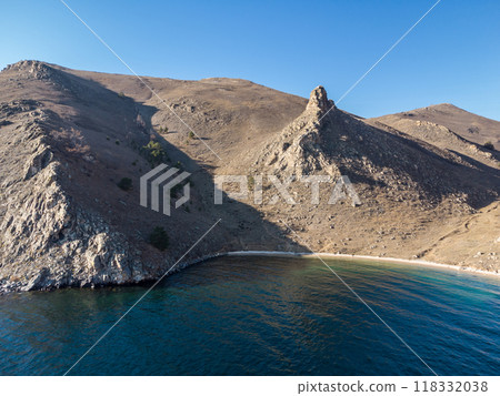 Lake Baikal. Angel Rock. bay at the cliff. Warm autumn days. Lake Baikal. Angel Rock. bay at the cliff. Warm autumn days. 118332038