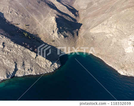 Lake Baikal. Angel Rock. bay at the cliff. Warm autumn days. 118332039
