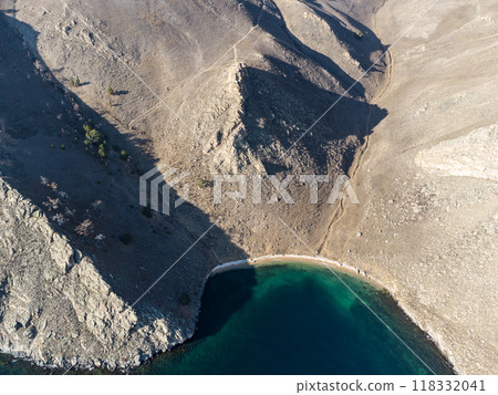 Lake Baikal. Angel Rock. bay at the cliff. Warm autumn days. Lake Baikal. Angel Rock. bay at the cliff. Warm autumn days. 118332041