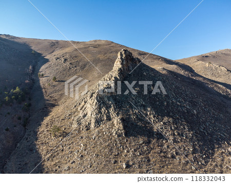 Lake Baikal. Angel Rock. Warm autumn days. 118332043