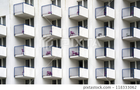 Monotonous boring empty balconies on a massive complex with small holiday apartments Monotonous boring empty balconies on a massive complex with small holiday apartments 118333062