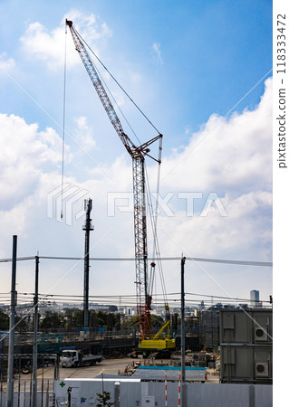 Apartment construction site: Heavy equipment crawler crane 118333472