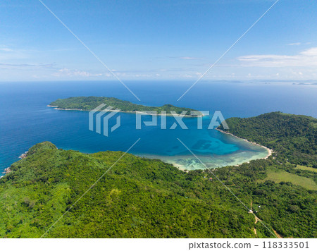Aerial view of Cagbuli Island and coastal beach in El Nido, Philippines. Aerial view of Cagbuli Island and coastal beach in El Nido, Philippines. 118333501