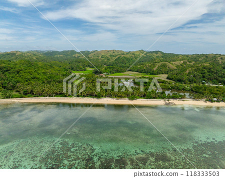 Tropical landscape of beach with white sand and turquoise water over reefs. Santa Fe, Tablas, Romblon. Philippines. 118333503