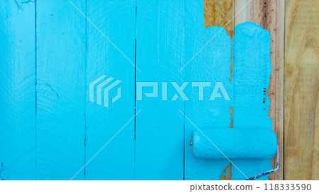 Set of tools for painting wall on wood background at home Set of tools for painting wall on wood background at home 118333590