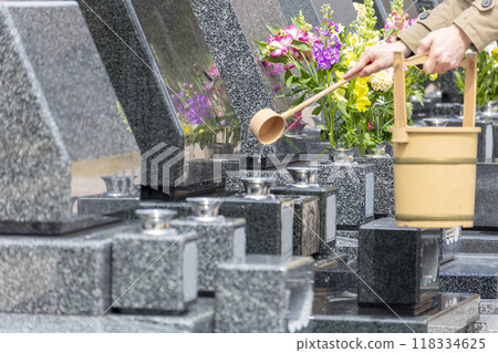 An image of a visit to a grave 118334625