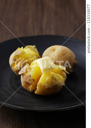 Delicious looking potato butter with melted butter 118338077