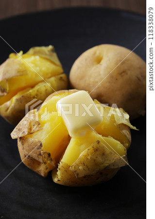 Delicious looking potato butter with melted butter Delicious looking potato butter with melted butter 118338079