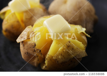 Delicious looking potato butter with melted butter Delicious looking potato butter with melted butter 118338086