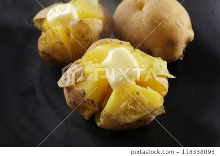 Delicious looking potato butter with melted butter Delicious looking potato butter with melted butter 118338093