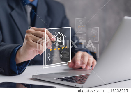 Hand with a digital interface real estate reviews and ratings. Highlights property evaluation and customer satisfaction. Useful for real estate, customer service, and online review platforms. 118338915