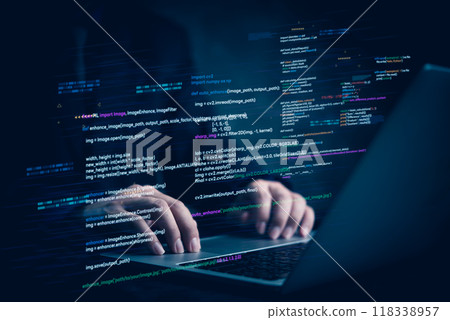 Hands typing on laptop with programming code on screen, representing software development. Perfect for coding, IT solutions, digital technology, web applications. Hands typing on laptop with programming code on screen, representing software development. Perfect for coding, IT solutions, digital technology, web applications. 118338957