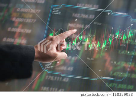 Hand pointing at financial data hologram, stock market trading graph. Symbolizes investment and market analysis. Ideal for financial services, trading platforms, and economic reports. Hand pointing at financial data hologram, stock market trading graph. Symbolizes investment and market analysis. Ideal for financial services, trading platforms, and economic reports. 118339058