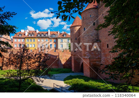 Scenic View of the Old Town Wall and Tower in Warsaw Poland Under Blue Sky 118340064