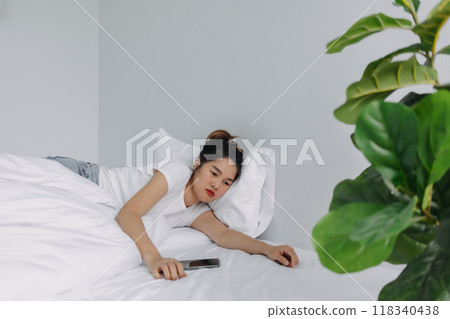 Sad and depressed woman stay alone in the room. Sad and depressed woman stay alone in the room. 118340438