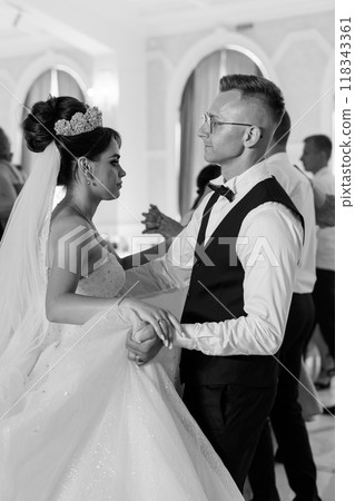 Enchanting First Dance of a Newlywed Couple in Elegant Black and White Enchanting First Dance of a Newlywed Couple in Elegant Black and White 118343361