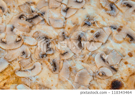 Delicious Gourmet Pizza with Fresh Sliced Mushrooms and Melted Cheese Topping 118343464