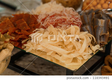 Gourmet Charcuterie Selection Featuring Assorted Deli Meats and Fish Delicacies Gourmet Charcuterie Selection Featuring Assorted Deli Meats and Fish Delicacies 118343491